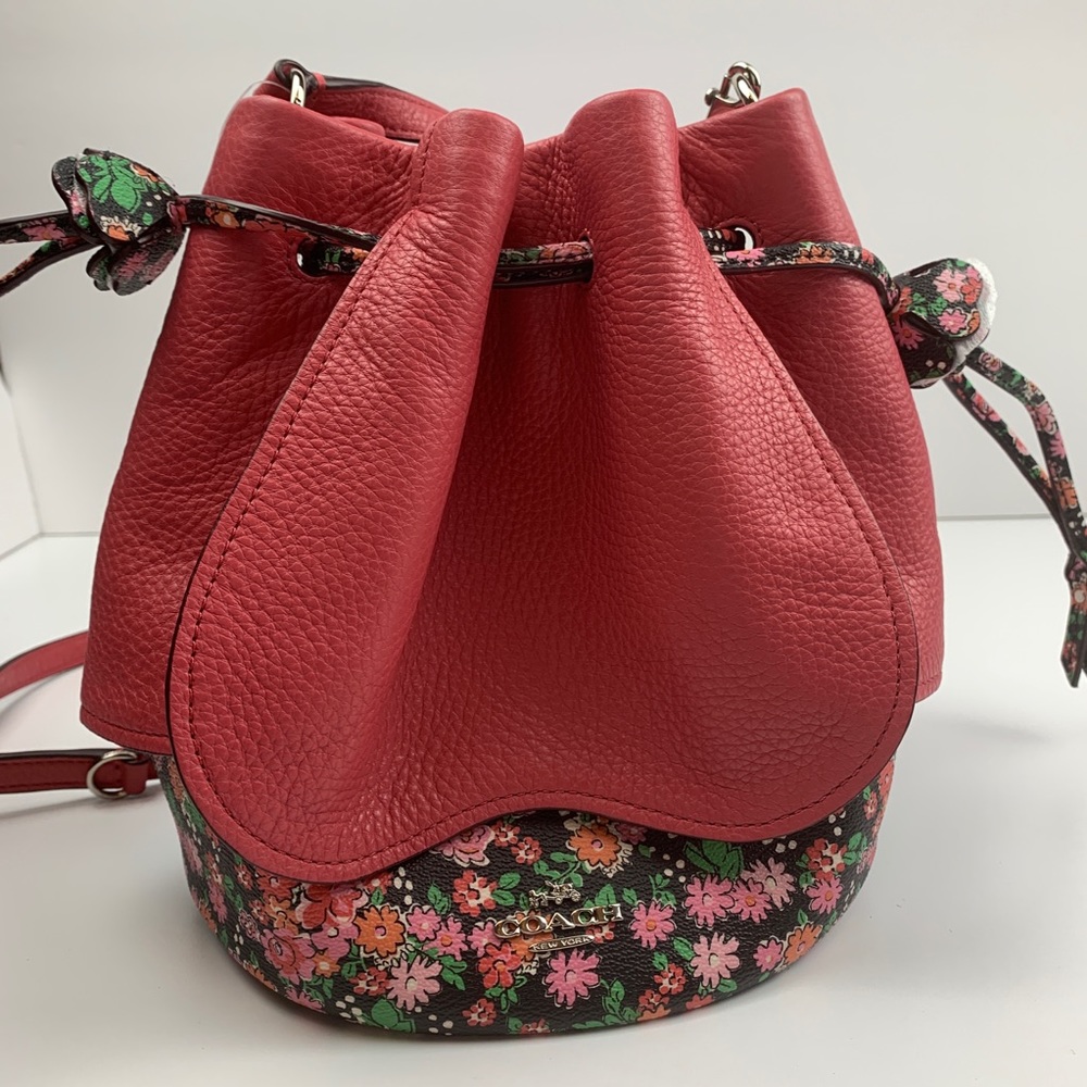 Coach petal drawstring crossbody purse.